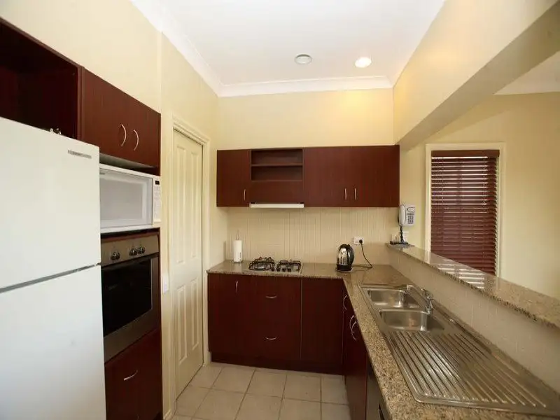 Main view of Homely townhouse listing, Unit 21/1 Greg Norman Drive, Sanctuary Lakes VIC 3030