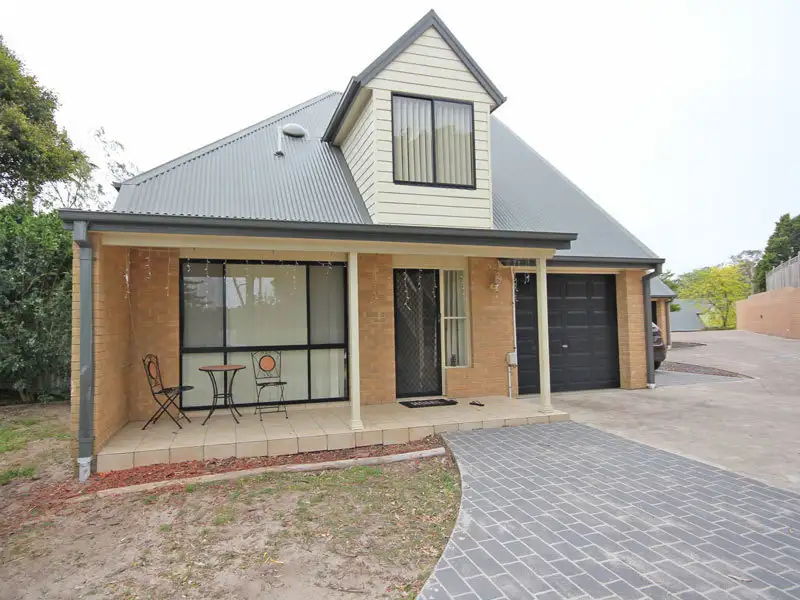 Main view of Homely townhouse listing, 1/140 Old Main Road, Anna Bay NSW 2316