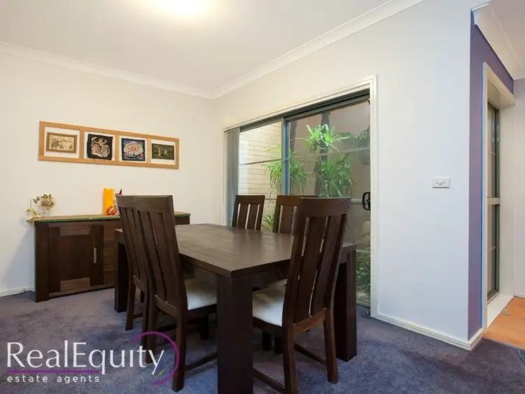 Third view of Homely townhouse listing, 1/20 Continua Court, Wattle Grove NSW 2173