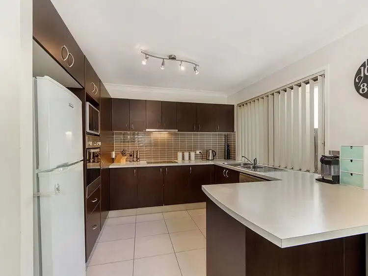 Third view of Homely house listing, 1/8 Witheren Circuit, Pacific Pines QLD 4211