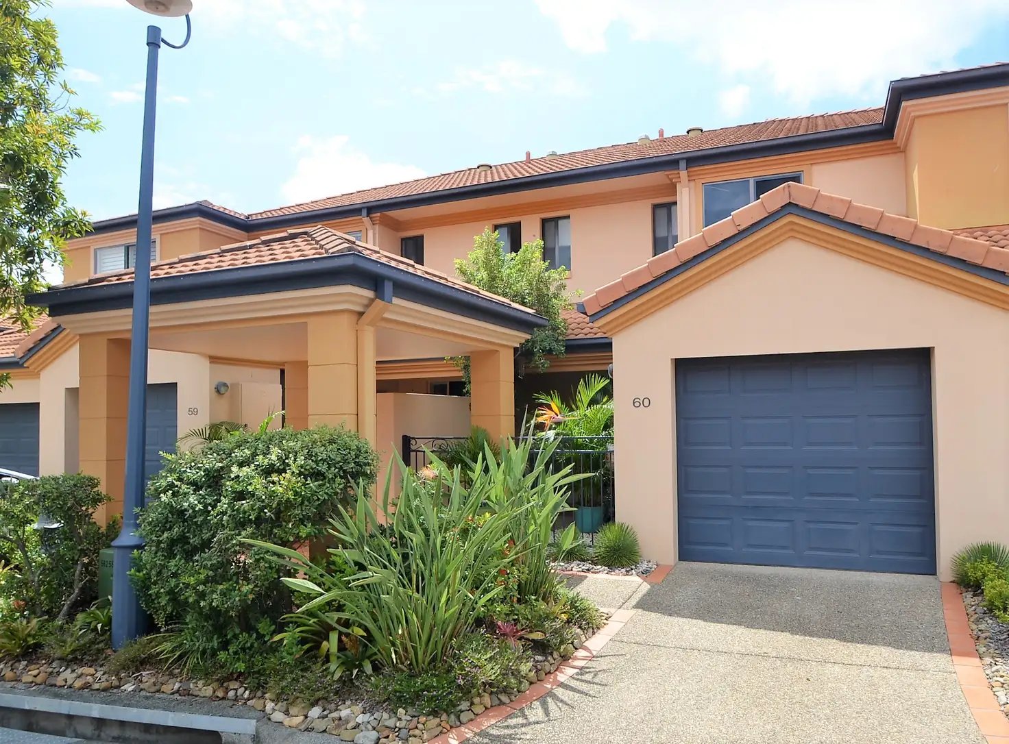 Main view of Homely townhouse listing, Unit 60/85 Palm Meadows Dr, Carrara QLD 4211