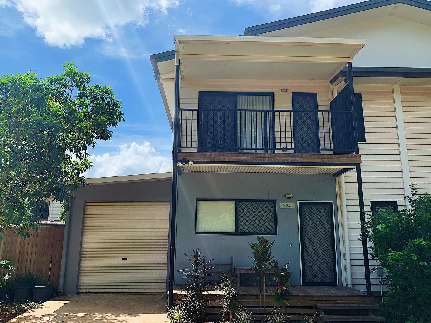 Main view of Homely townhouse listing, 1/12 Yileen Court, Rocky Point QLD 4874