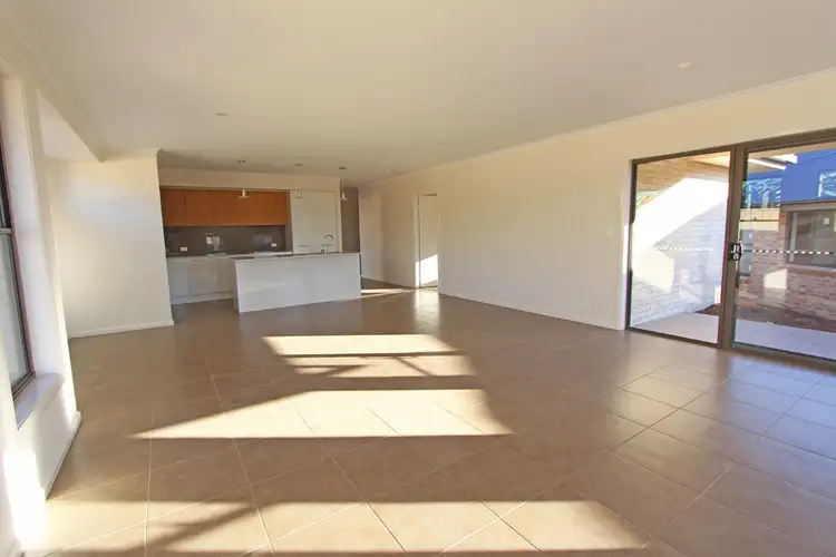 Main view of Homely villa listing, 1/7 Celtic Court, Lake Cathie NSW 2445