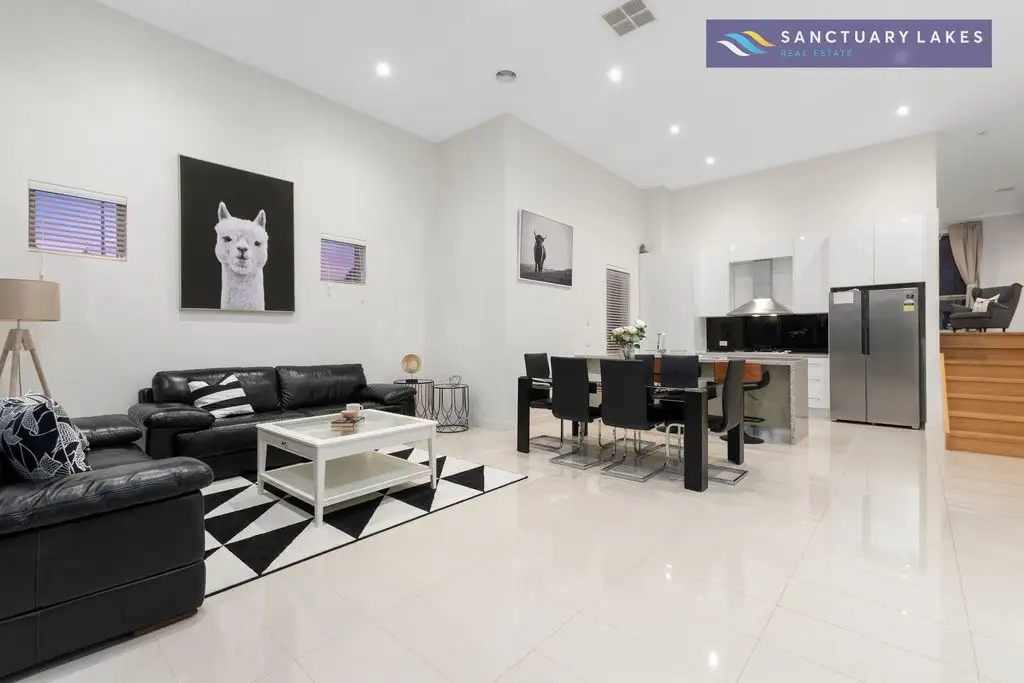 Main view of Homely townhouse listing, 1/1-9 Eagleview Place, Sanctuary Lakes VIC 3030