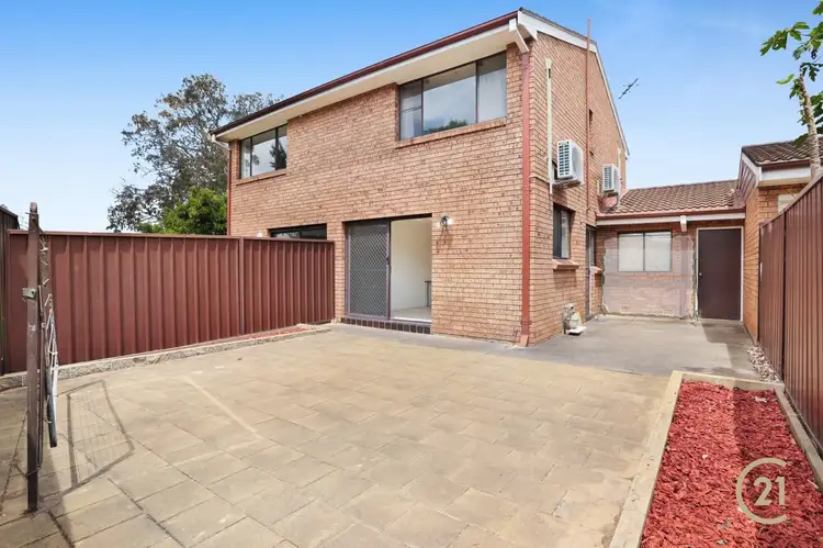 Second view of Homely townhouse listing, 2/201-207 Harrow Road, Glenfield NSW 2167