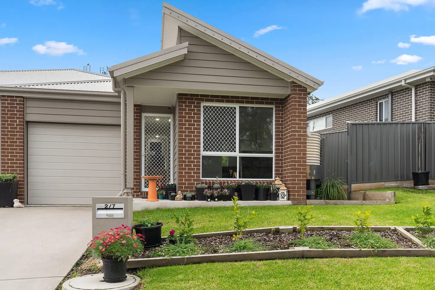 Main view of Homely villa listing, 2/7 Heggie Close, Cameron Park NSW 2285