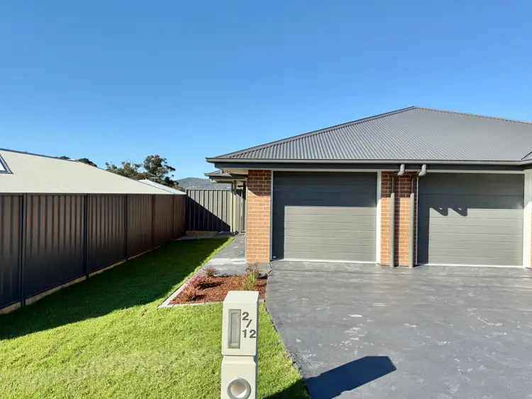 Main view of Homely semi-detached listing, 2/12 Brushworth Drive, Edgeworth NSW 2285
