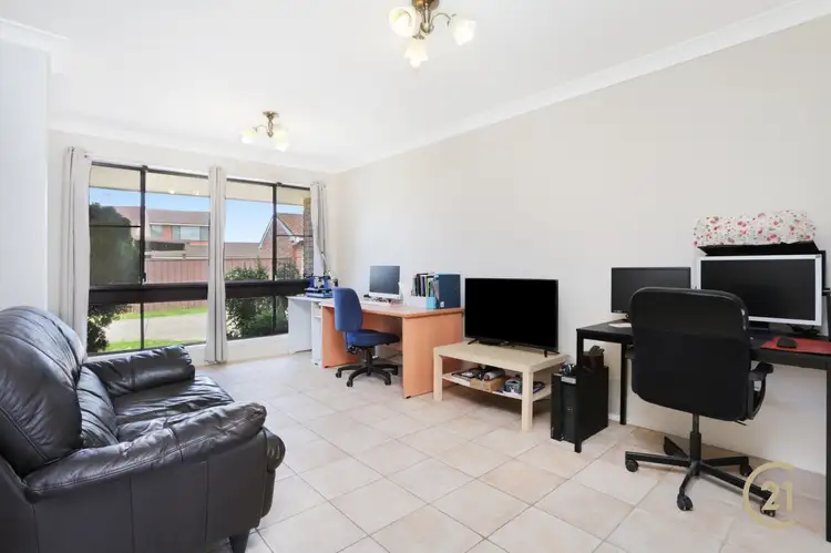 Third view of Homely townhouse listing, 2/201-207 Harrow Road, Glenfield NSW 2167