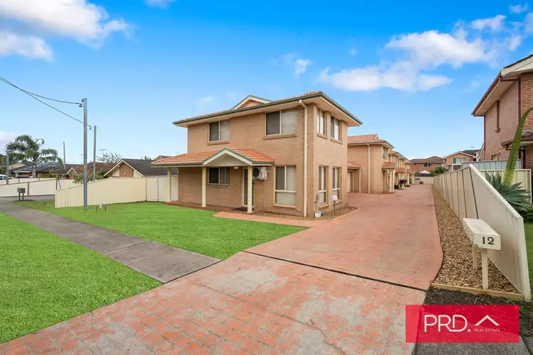 Main view of Homely townhouse listing, 12 Thelma Street, Lurnea NSW 2170