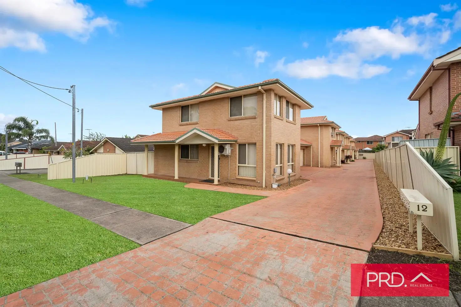 Main view of Homely townhouse listing, 12 Thelma Street, Lurnea NSW 2170