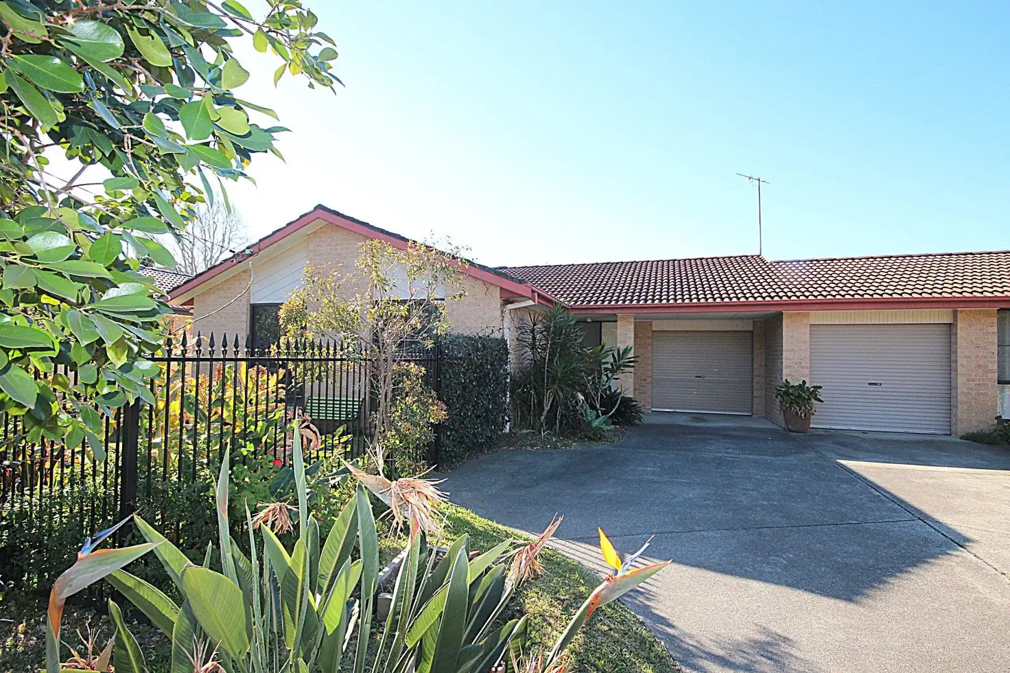 Main view of Homely semi-detached listing, 1/8 Tilligerry Track, Tanilba Bay NSW 2319