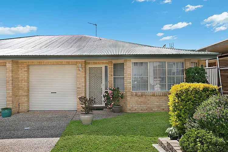 Main view of Homely semi-detached listing, 2/15 Caves Beach Road, Caves Beach NSW 2281