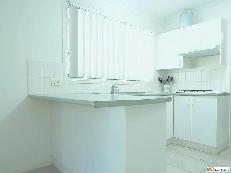 Third view of Homely house listing, 4 Woodi Close, Glenmore Park NSW 2745