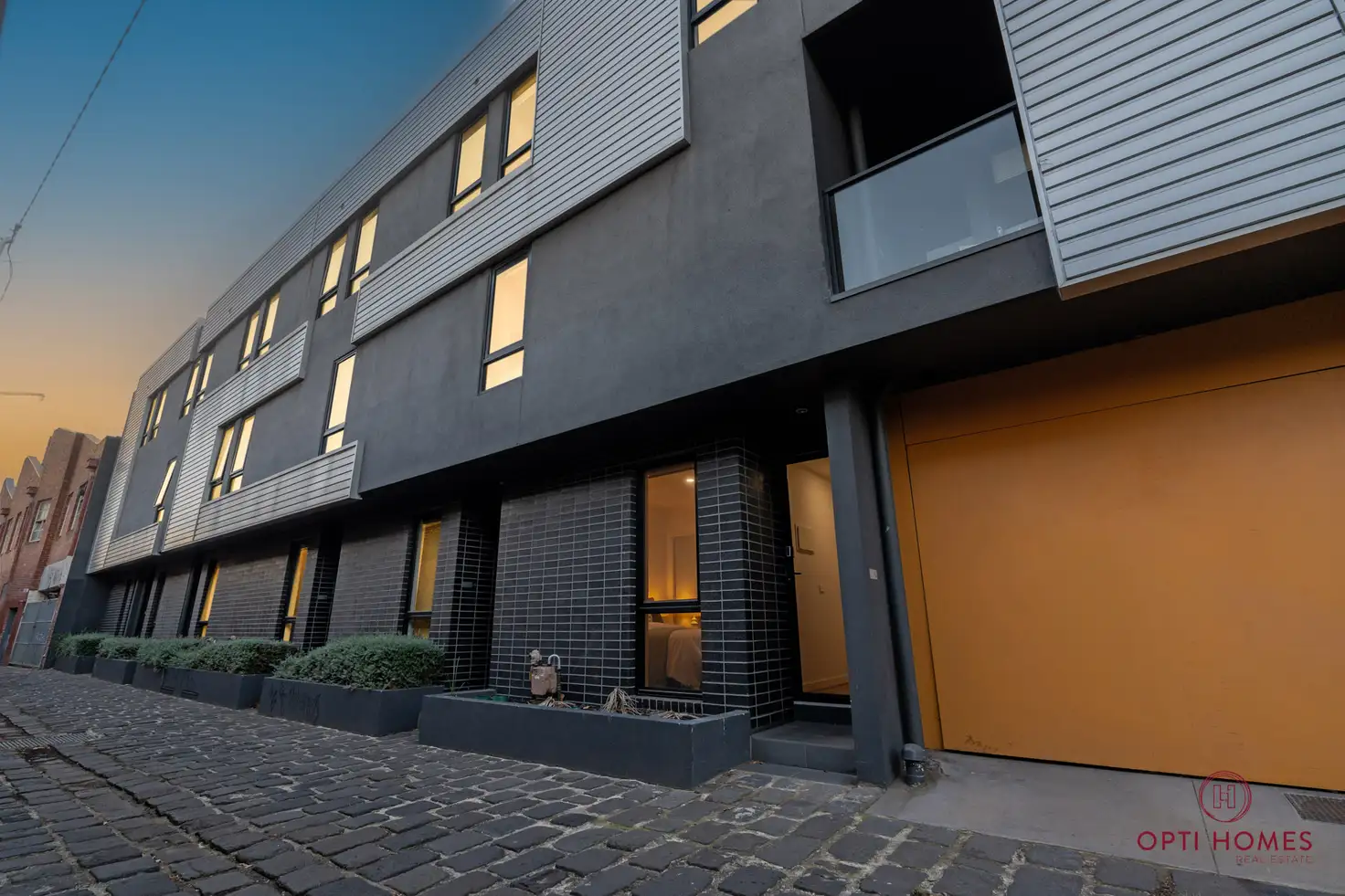 Main view of Homely townhouse listing, 12 Greenham Place, Footscray VIC 3011