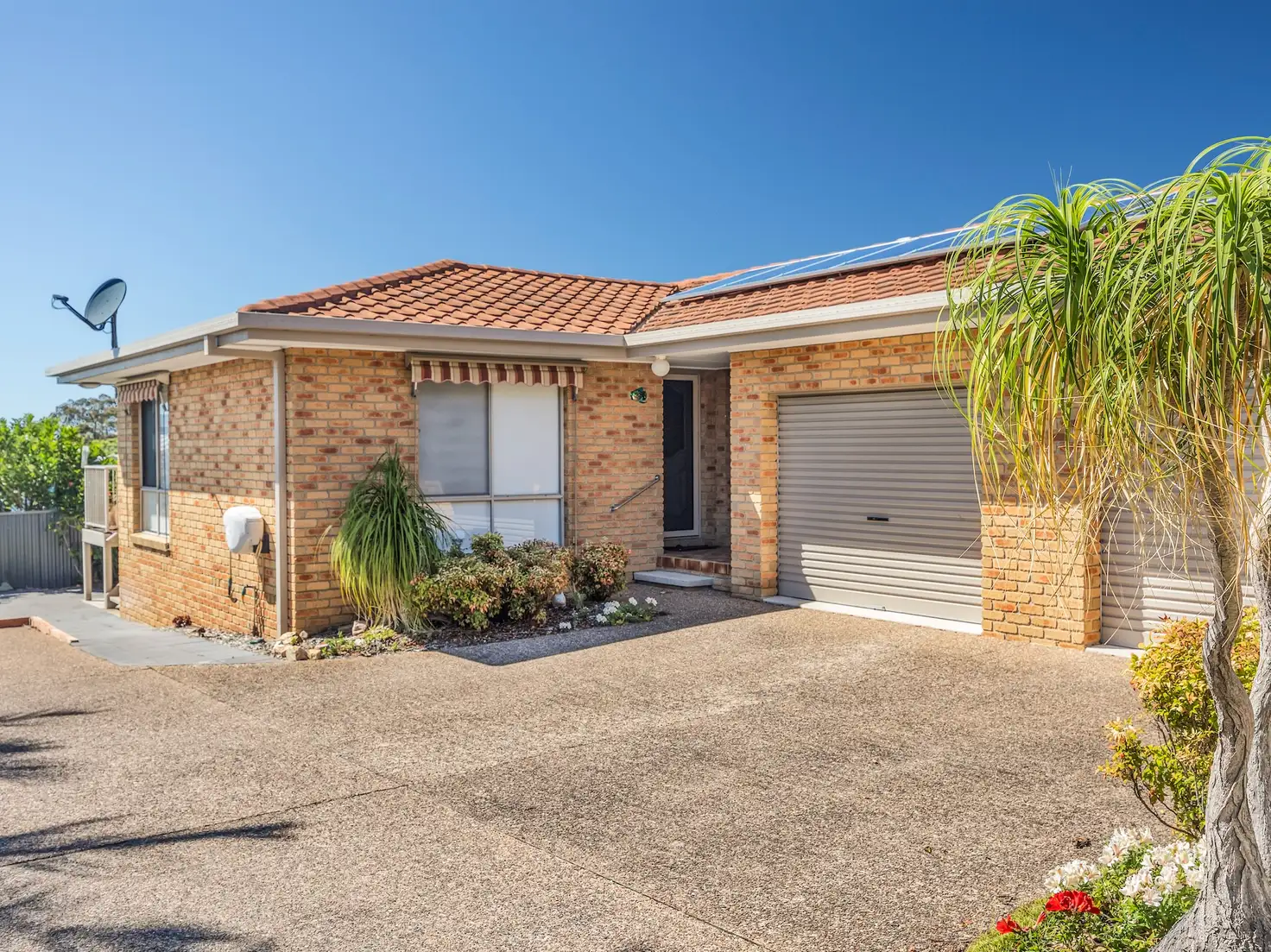 Main view of Homely semi-detached listing, 2/4 Golf Circuit, Tura Beach NSW 2548