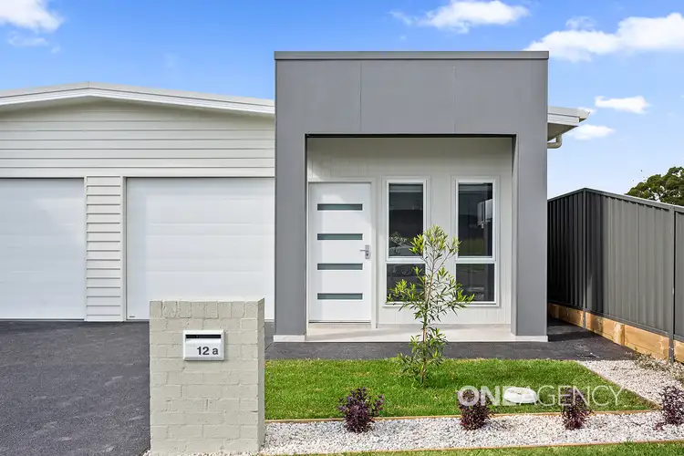 Main view of Homely semi-detached listing, 1/12 Sundew Street, Horsley NSW 2530