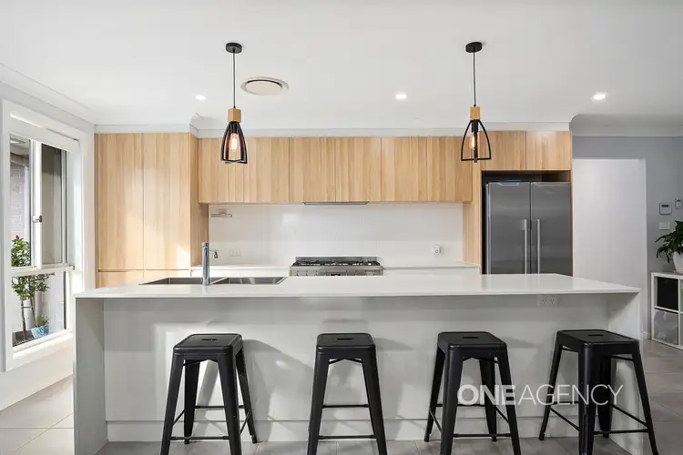 10 Wildflower Crescent, Calderwood NSW 2527