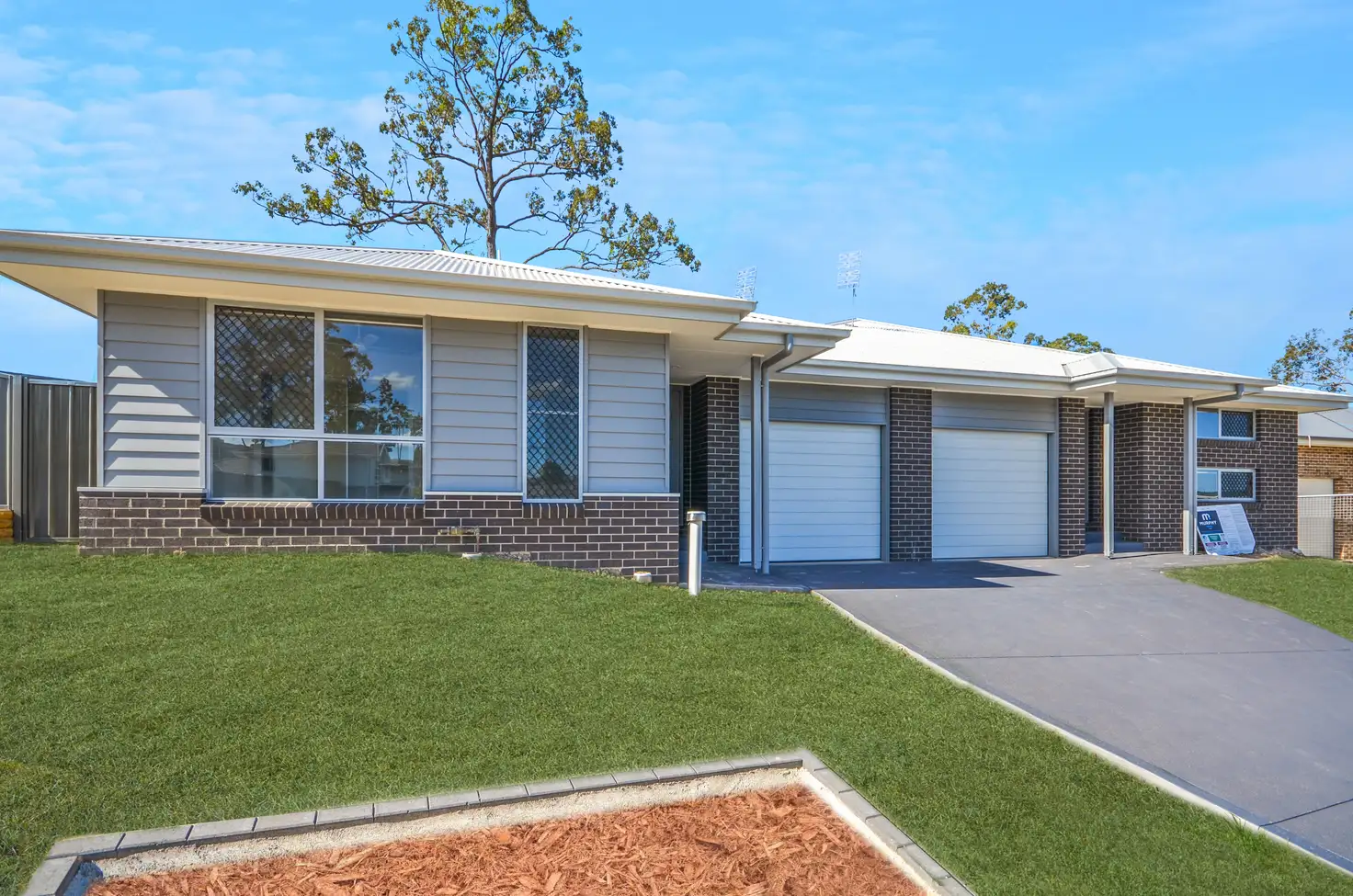 Main view of Homely semi-detached listing, 61 Comel Avenue, Cameron Park NSW 2285