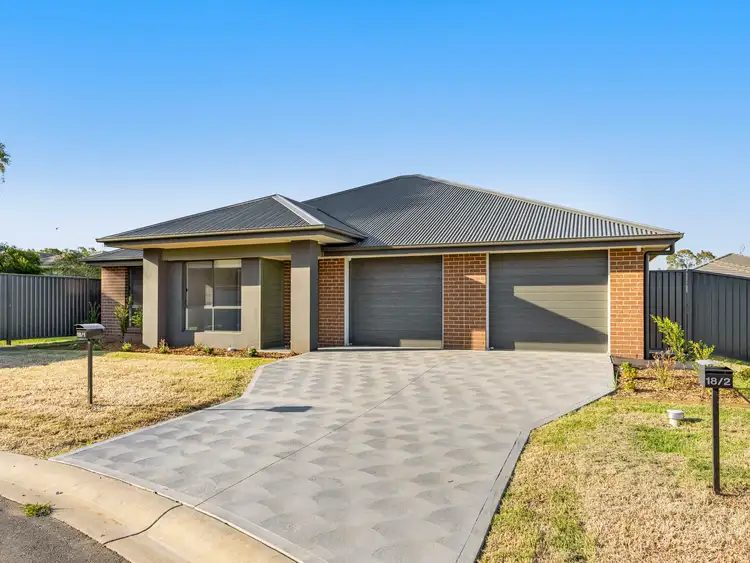Main view of Homely semi-detached listing, 2/18 Melaleuca Way, Cessnock NSW 2325