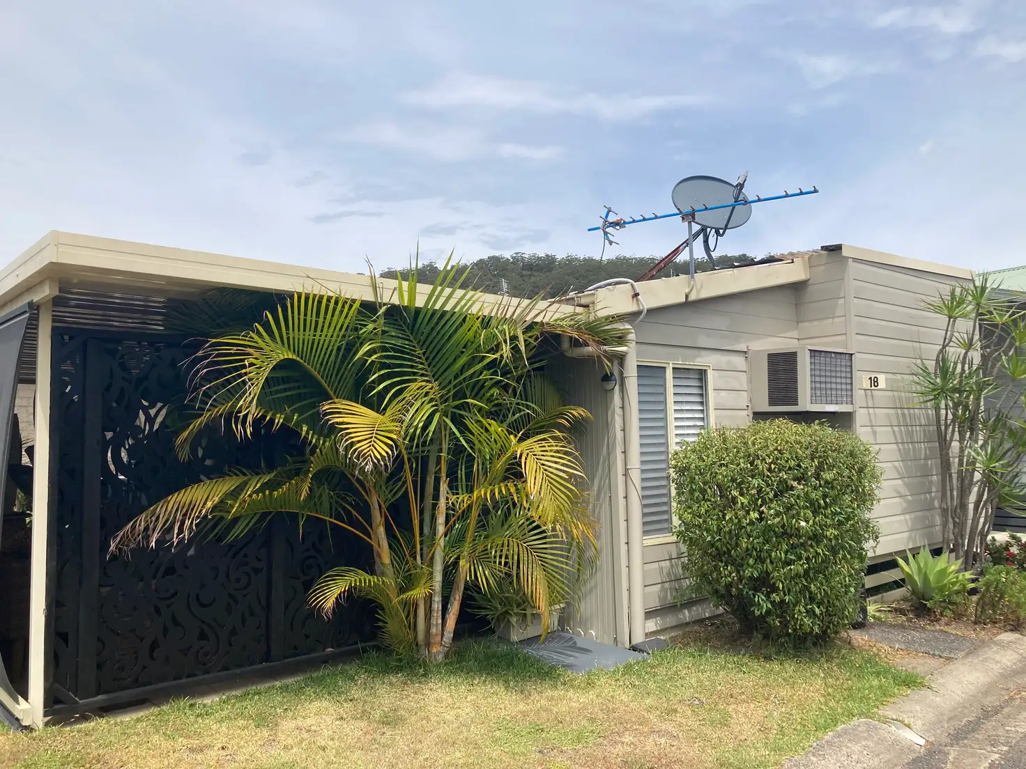 Main view of Homely retirement listing, 18 Frangipani Avenue, Green Point NSW 2251