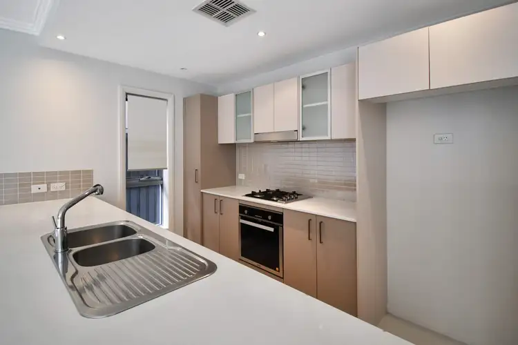 Third view of Homely townhouse listing, 2a Sanananda Road, Holsworthy NSW 2173