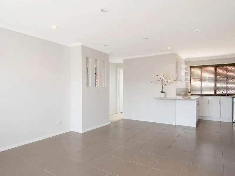 Main view of Homely semi-detached listing, 1/12 Callistemon Court, Arundel QLD 4214