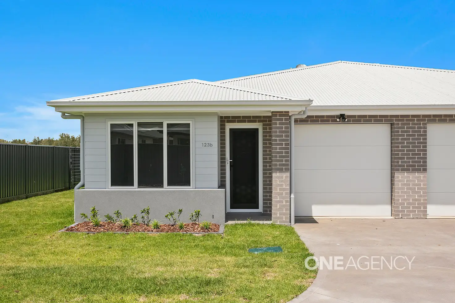 Main view of Homely townhouse listing, 123B Lancaster Drive, Badagarang NSW 2540