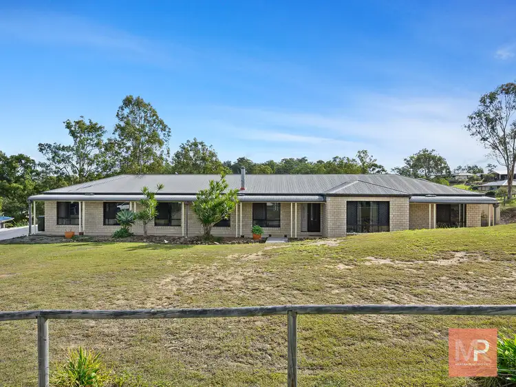 9 Borrowdale Court, Mundoolun QLD 4285
