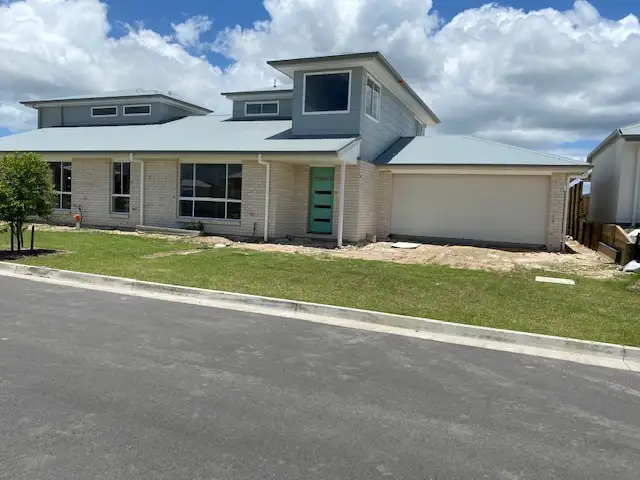 Main view of Homely semi-detached listing, 1/10 Dorchester Close, Pimpama QLD 4209
