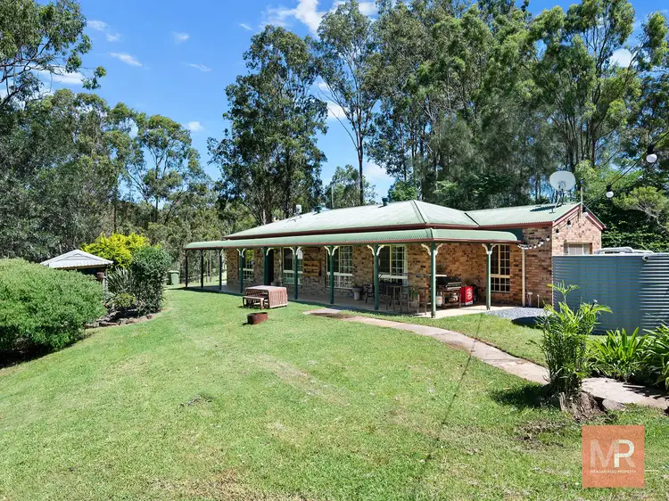 133 Canterbury Drive, Mundoolun QLD 4285