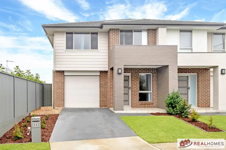 Main view of Homely semi-detached listing, 8b Foxtail Drive, Denham Court NSW 2565