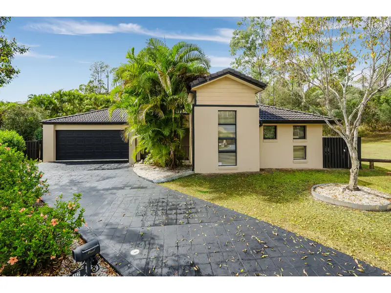 Main view of Homely house listing, 12 Hemes Cl, Pacific Pines QLD 4211