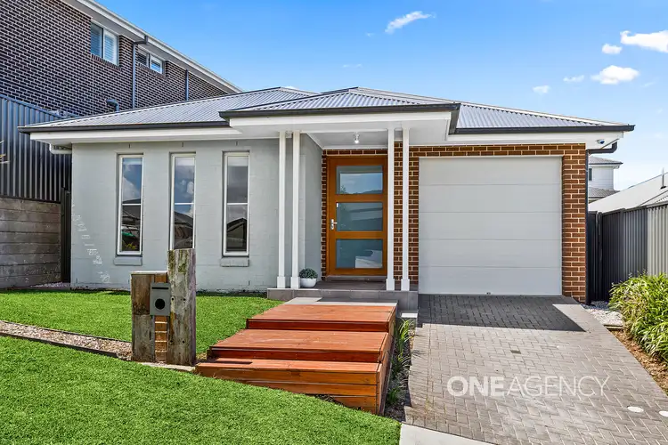 Main view of Homely house listing, 14 Brotheridge Avenue, Calderwood NSW 2527