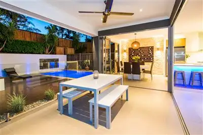 Main view of Homely semi-detached listing, 66A Compass Drive, Biggera Waters QLD 4216