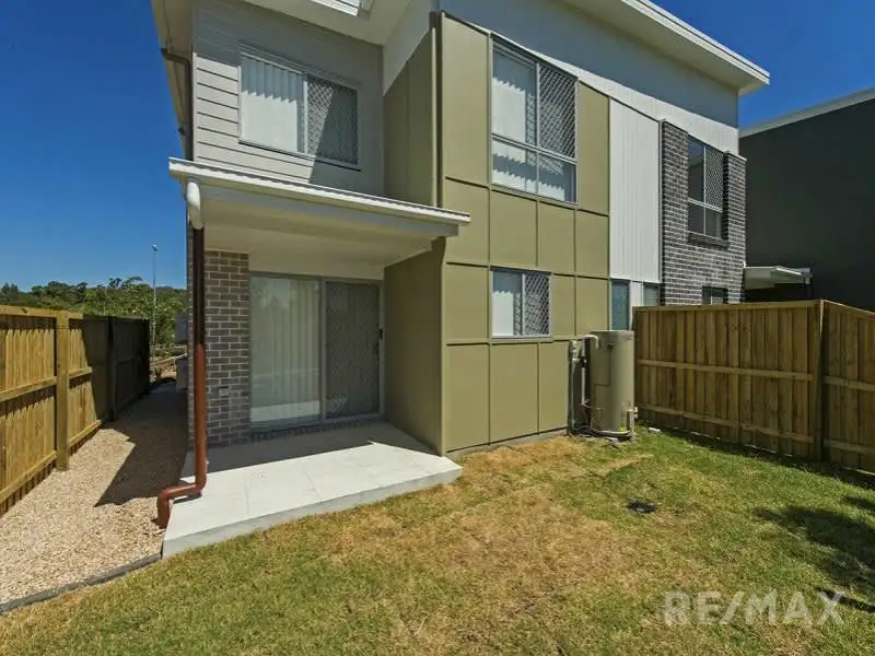 Main view of Homely townhouse listing, 12/57 McAuley Pde, Pacific Pines QLD 4211