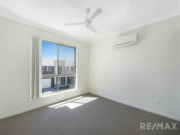 Sixth view of Homely townhouse listing, 12/57 McAuley Pde, Pacific Pines QLD 4211