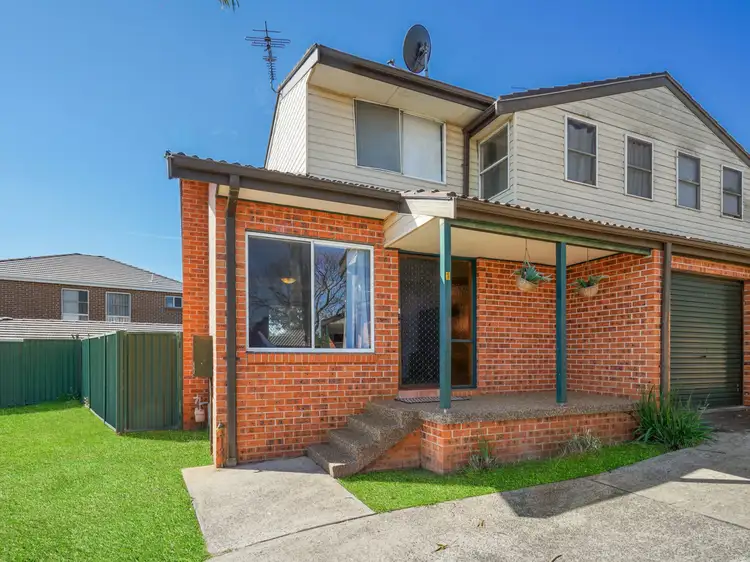 Main view of Homely townhouse listing, 1/84 Townson Avenue, Minto NSW 2566