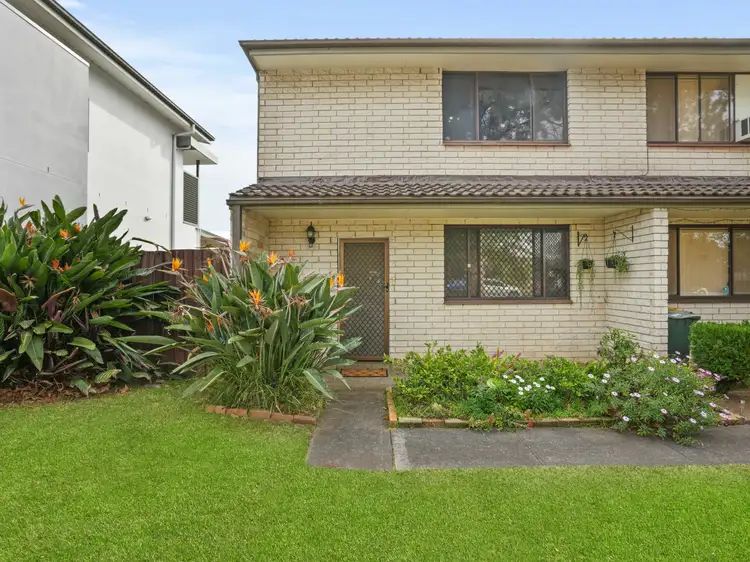 Main view of Homely townhouse listing, 1/9-13 SURREY ST MINTO, Minto NSW 2566