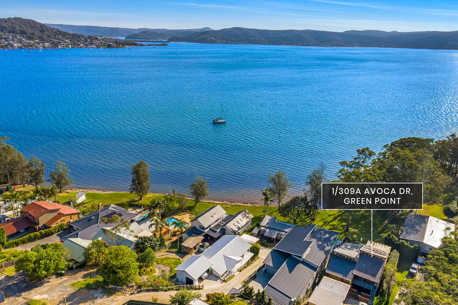 Main view of Homely townhouse listing, 1/309a Avoca Drive, Green Point NSW 2251