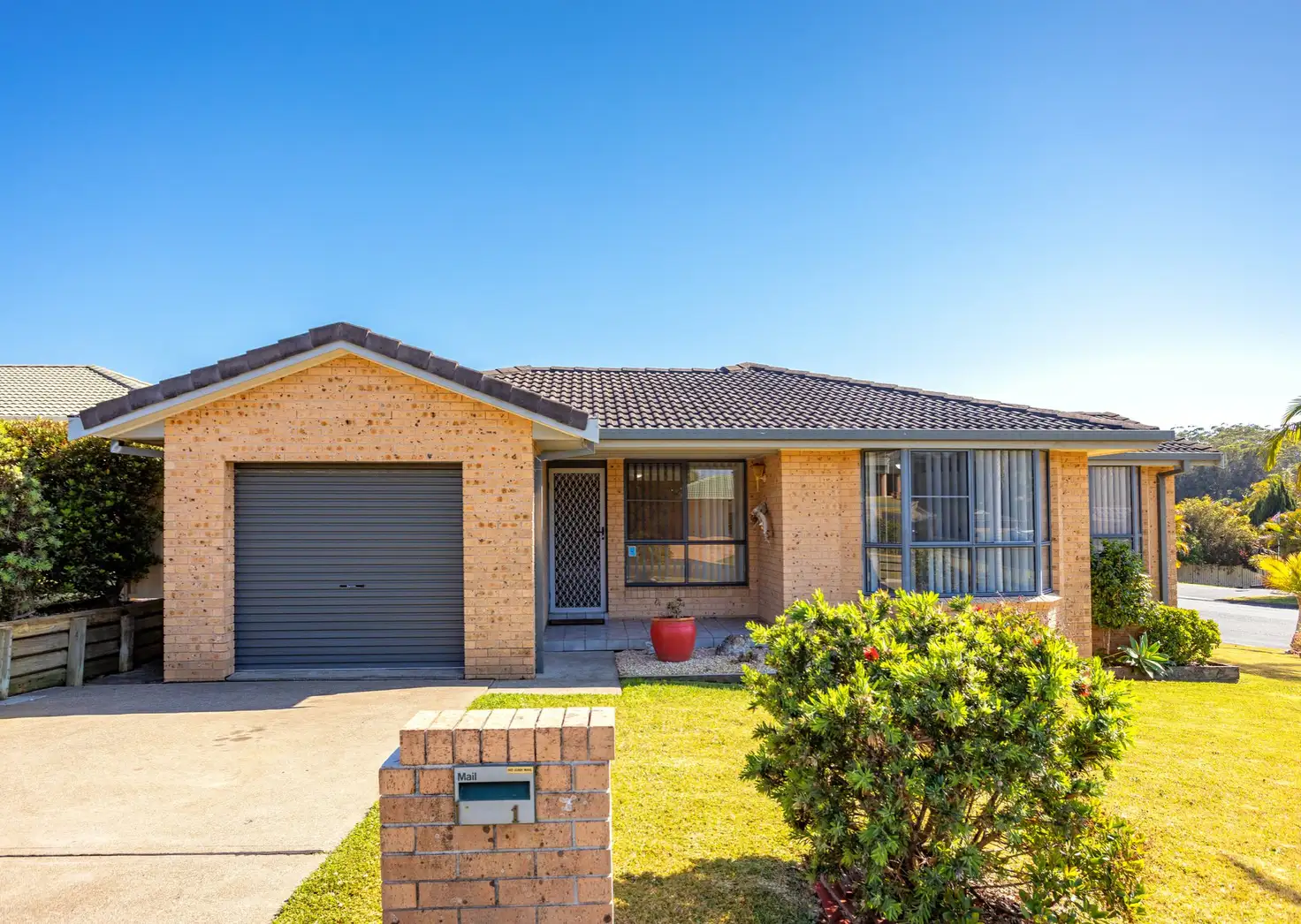 Main view of Homely semi-detached listing, 1/1 Corkwood Street, Old Bar NSW 2430