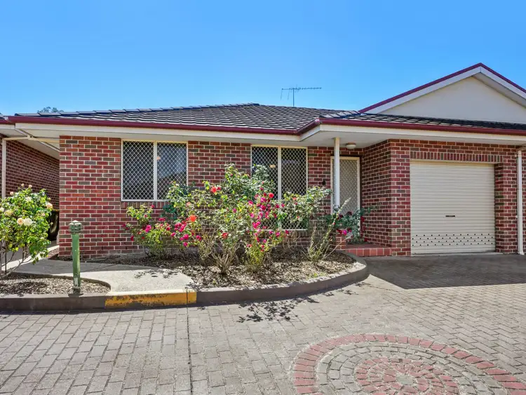 Main view of Homely villa listing, 4/19 Azalea Place, Macquarie Fields NSW 2564