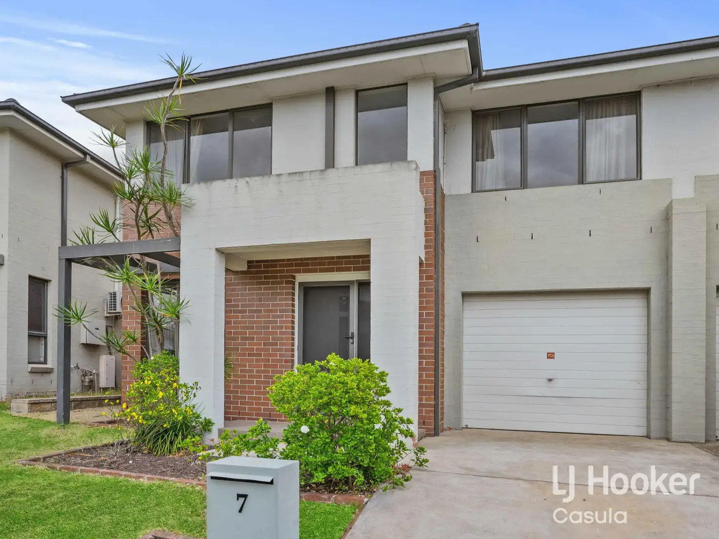 Main view of Homely semi-detached listing, 7 Grenada Road, Glenfield NSW 2167