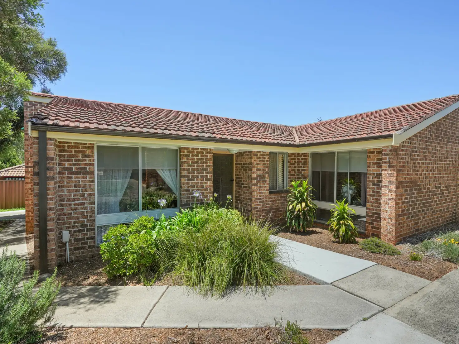 Main view of Homely villa listing, 1/23 Second Avenue, Macquarie Fields NSW 2564