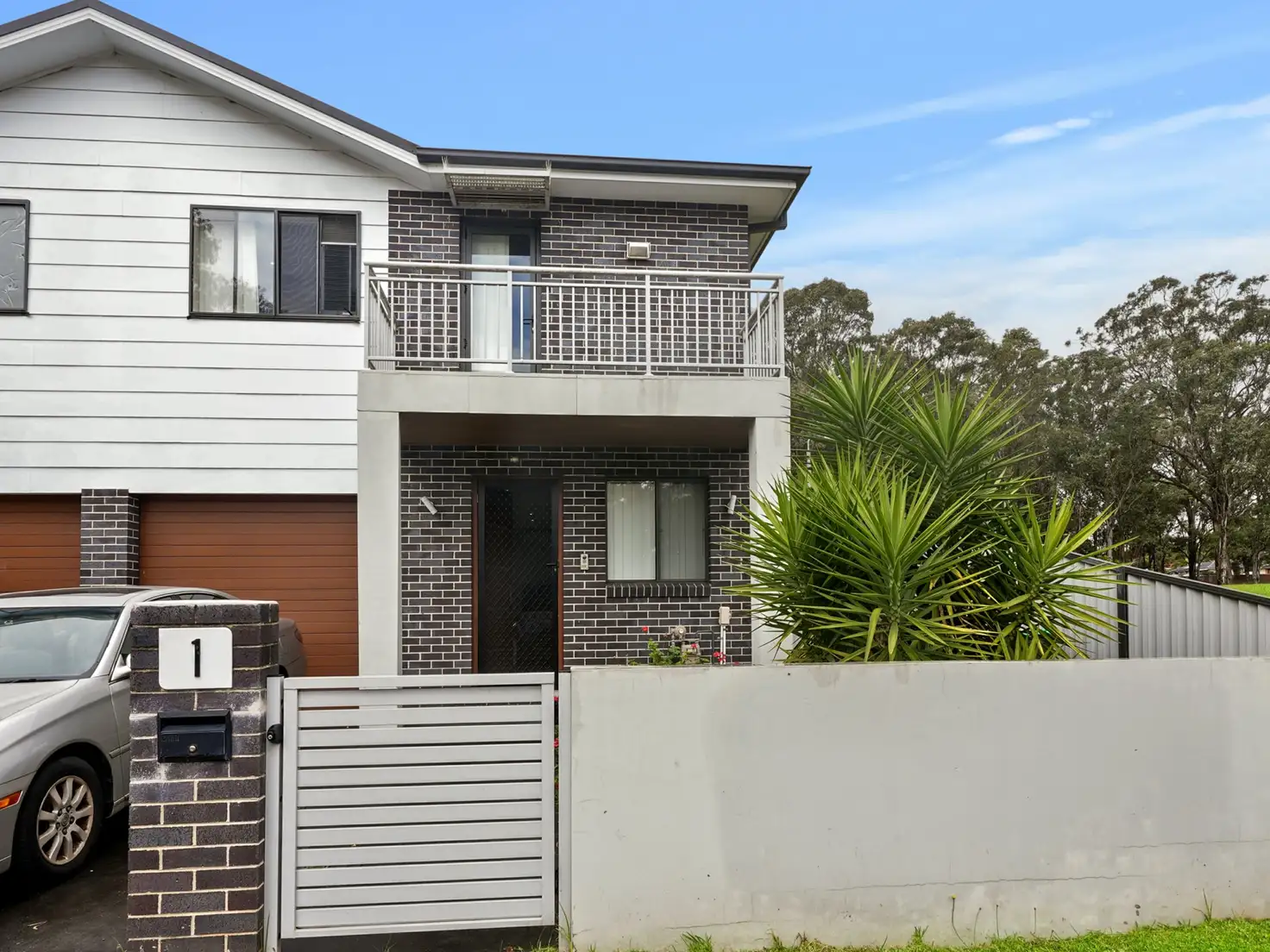 Main view of Homely townhouse listing, 1/1 Harold Street, Macquarie Fields NSW 2564