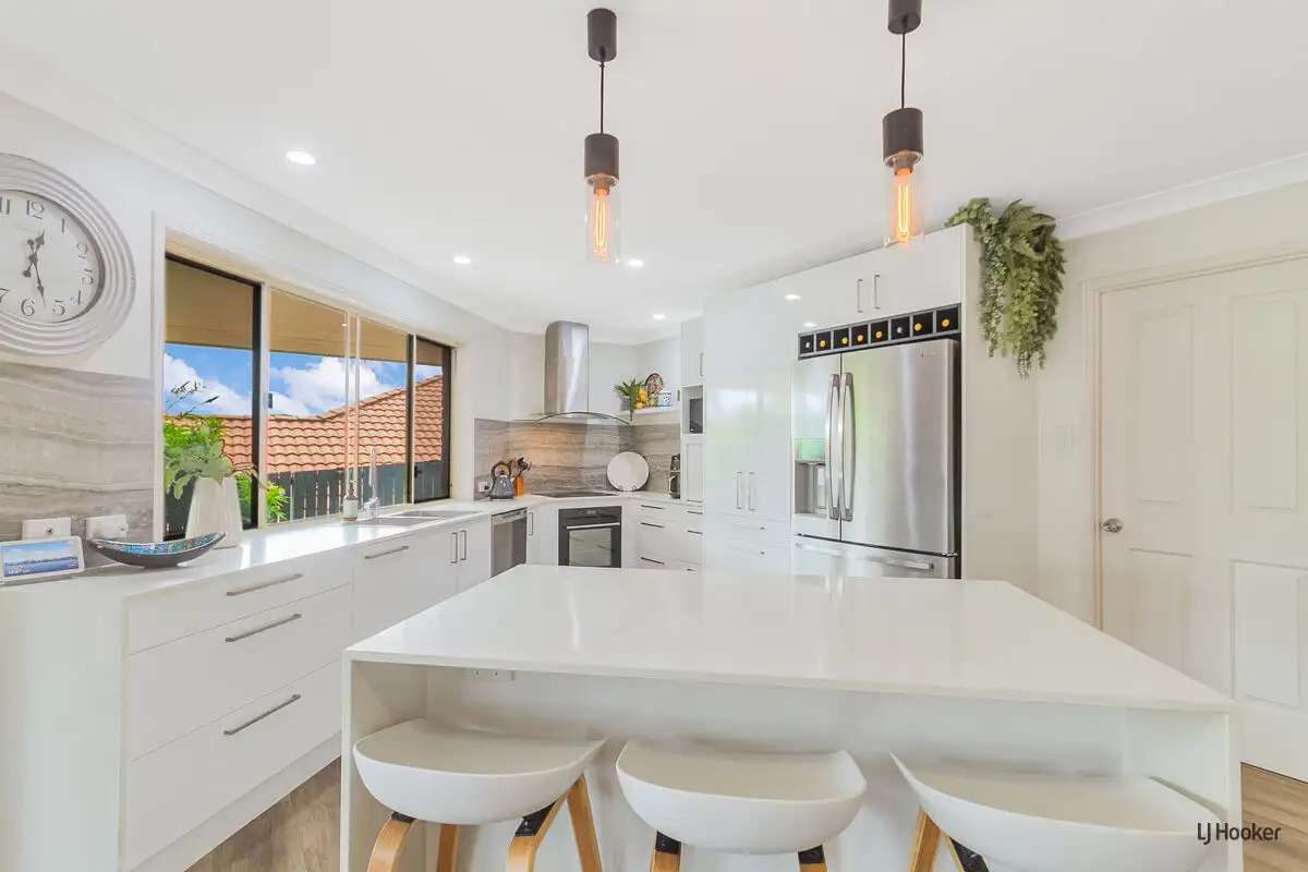 Main view of Homely semi-detached listing, 1/23 Grassmere Court, Banora Point NSW 2486