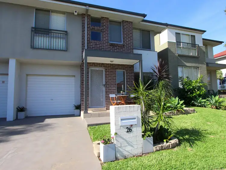 Main view of Homely semi-detached listing, 26 Northampton Drive, Glenfield NSW 2167