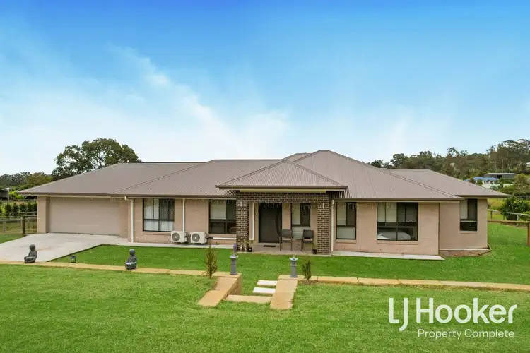 115-119 Munroe Drive, Woodhill QLD 4285