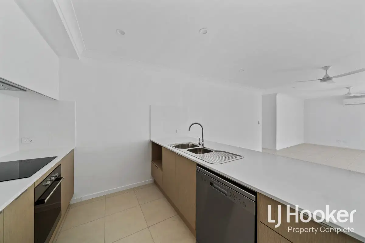 Main view of Homely semi-detached listing, 2/4 Alexander Place, Gleneagle QLD 4285