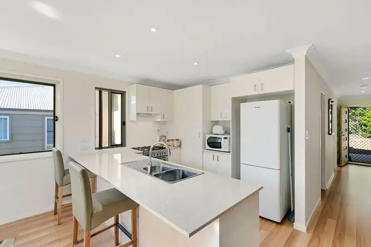 Second view of Homely semi-detached listing, 1/13 Castlereagh Close, Pacific Pines QLD 4211