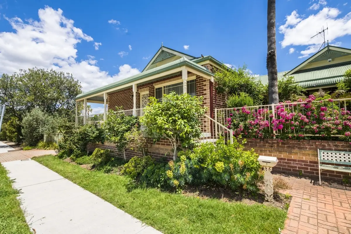 Main view of Homely townhouse listing, 1/28 Macquoid Street, Queanbeyan NSW 2620